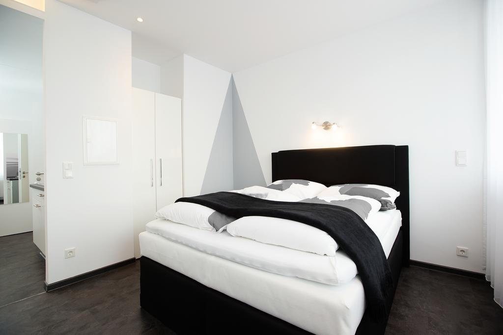 Design Sleepy Cologne Aparthotel Room photo